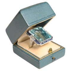 Emerald Cut Aquamarine (Approx 24-Carats) and Sapphire Halo Ring, Platinum
