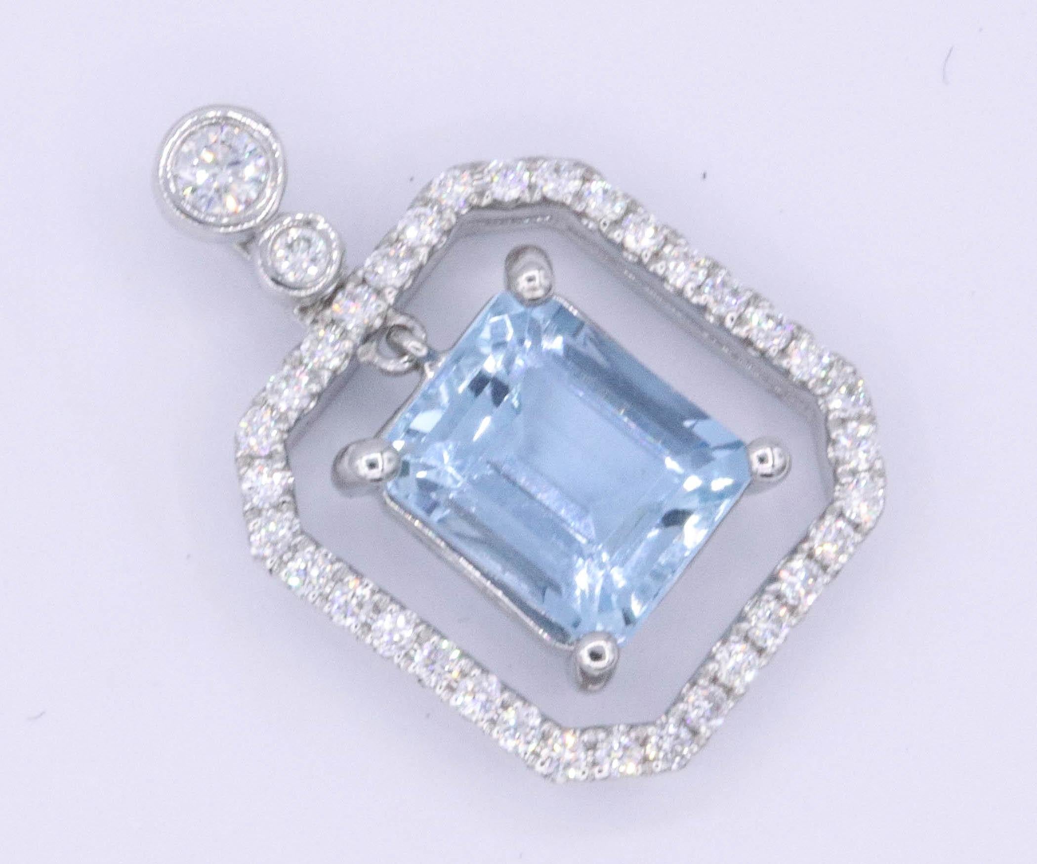 This beautiful Emerald cut Aquamarine is set in 14 K White Gold surrounded with 0.29 Carats of Diamonds.
The aquamarine weights 1.98 cts.
The emerald measures 8 x 6 mm