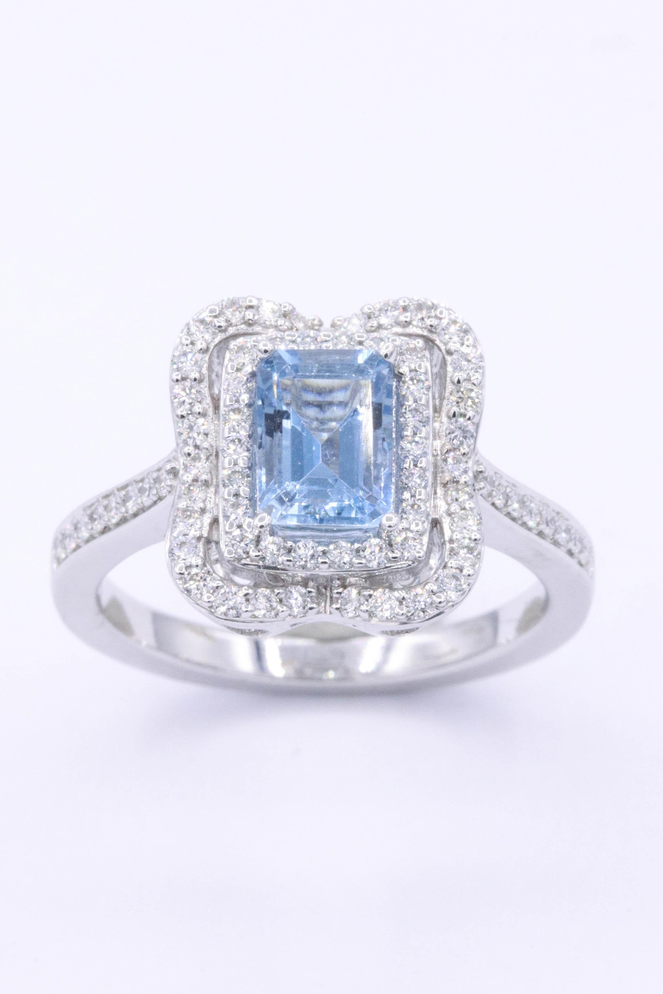 14K white gold
the center stone is a beautiful emerald cut Aquamarine 0.92 cts and the diamonds weight 0.43 cts.
Aquamarine measures 7 x 5 mm
The top of the ring measures 1.2 cm x 1cm
The ring will be sized to your finger size