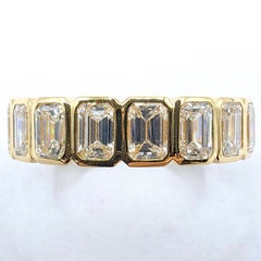 Emerald Cut Bezel Set Diamond Eternity Wedding Band Ring in 18K Yellow Gold