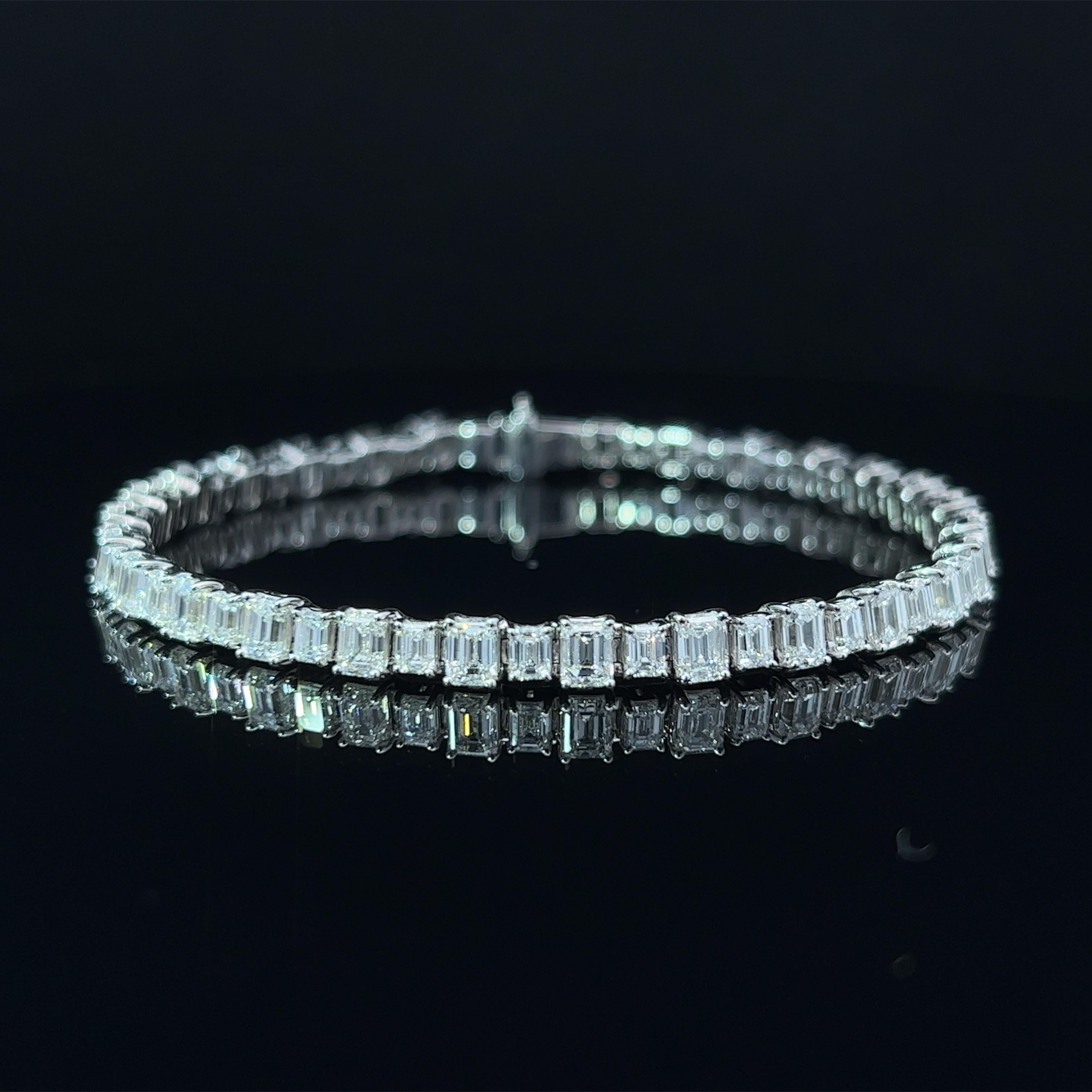 Diamond Shape: Emerald Cut  
Total Diamond Weight: 9.58
Individual Diamond Weight: .25ct & 0.10ct
Color/Clarity: FG VVS  
Metal: 18K White Gold 
Metal Weight: 14.61g

Key Features:

Emerald-Cut Diamonds: The centerpiece of this bracelet is a