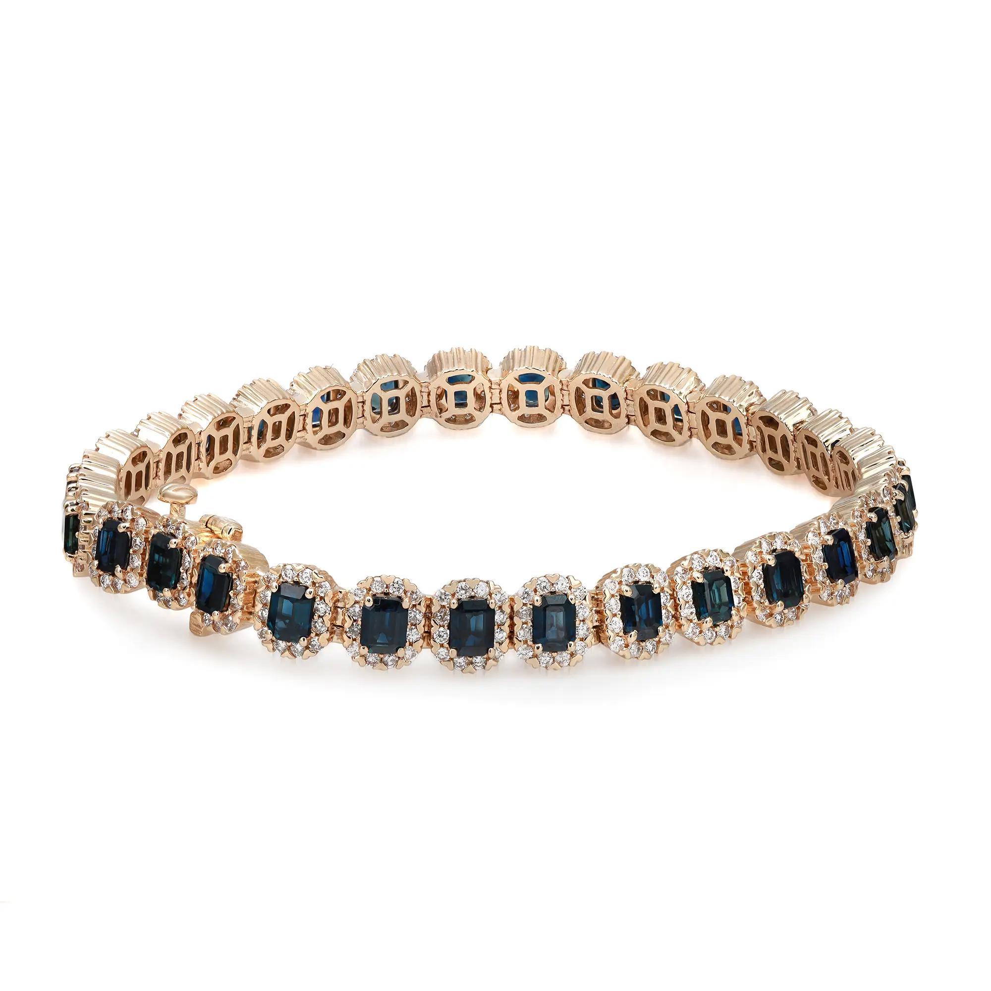 This stunning and exemplary bracelet is crafted in 14K yellow gold. Starring 31 radiant prong set emerald cut blue sapphire, set with a halo of bright white round cut diamonds. Total diamond weight: 2.30 carats. Diamond quality: H-I and clarity SI.