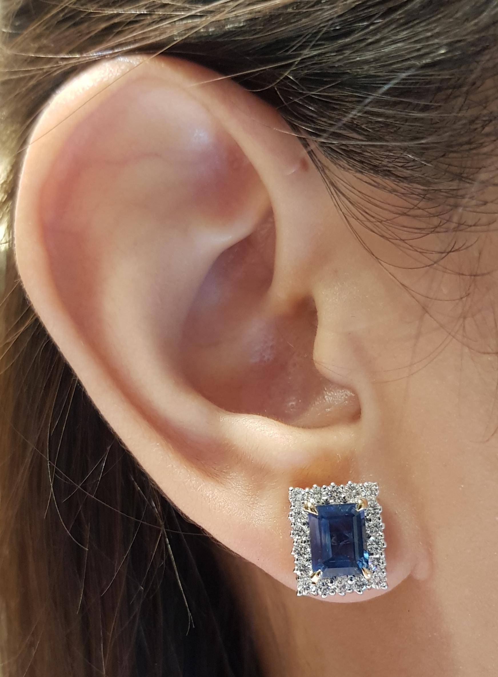 Blue Sapphire 3.21 carats with Diamond 0.91 carat Earrings set in 18 Karat Gold Settings

Width:  1.0 cm 
Length:  1.2 cm
Total Weight: 6.36 grams

