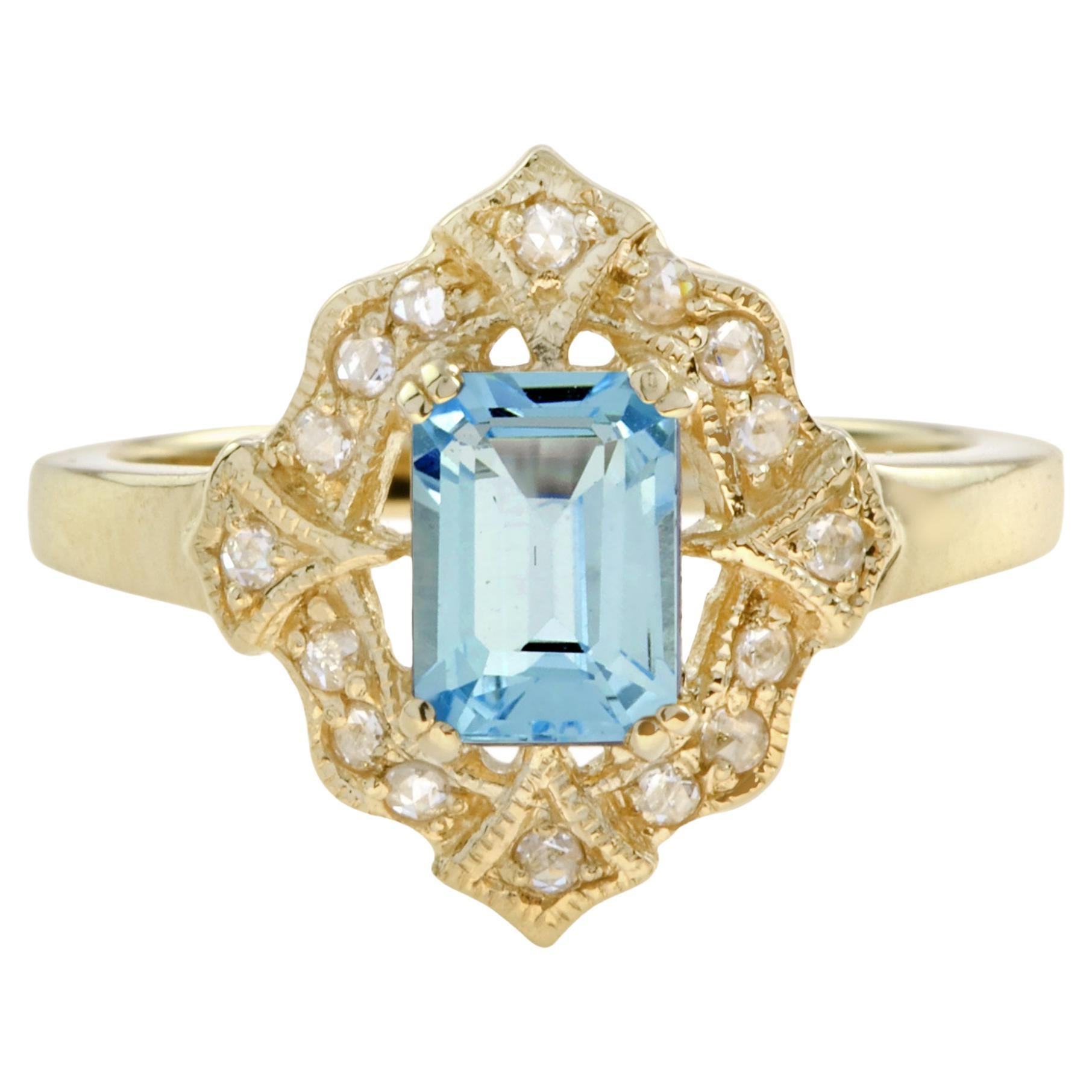 En vente :  Bague de style vintage en or jaune 14 carats avec topaze bleue taille émeraude et halo de diamants