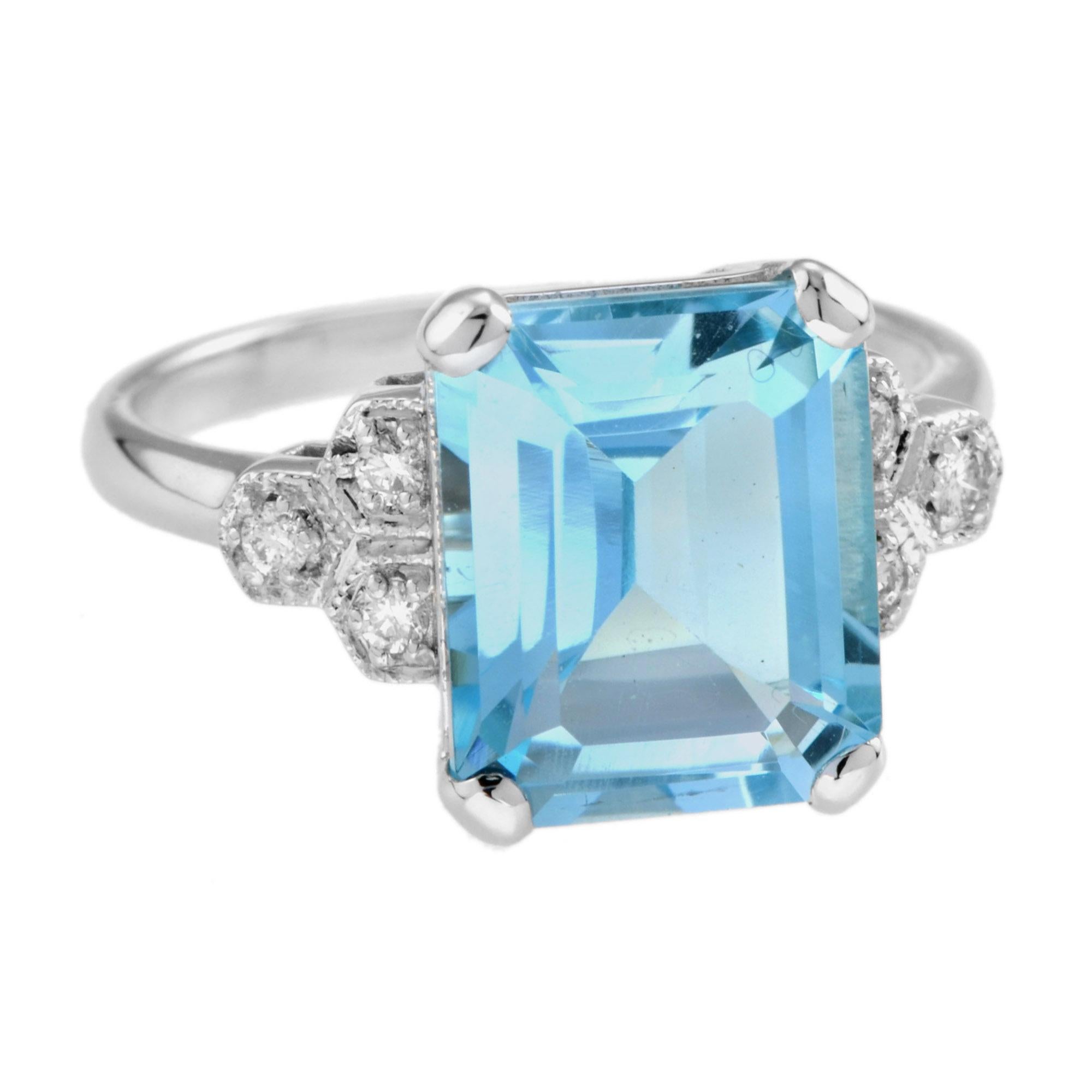 Gorgeous 9k white gold ring, beautifully decorated with an emerald cut blue topaz. The center peice is adorned with round cut diamonds on either side. A timeless piece of jewelry that is suitable for not only a special gift, but also as an