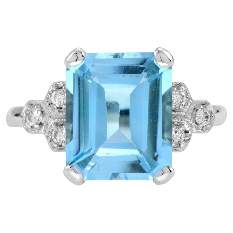 9ct White Gold 2.77ct Emerald Cut Blue Topaz and Diamond Dress Ring