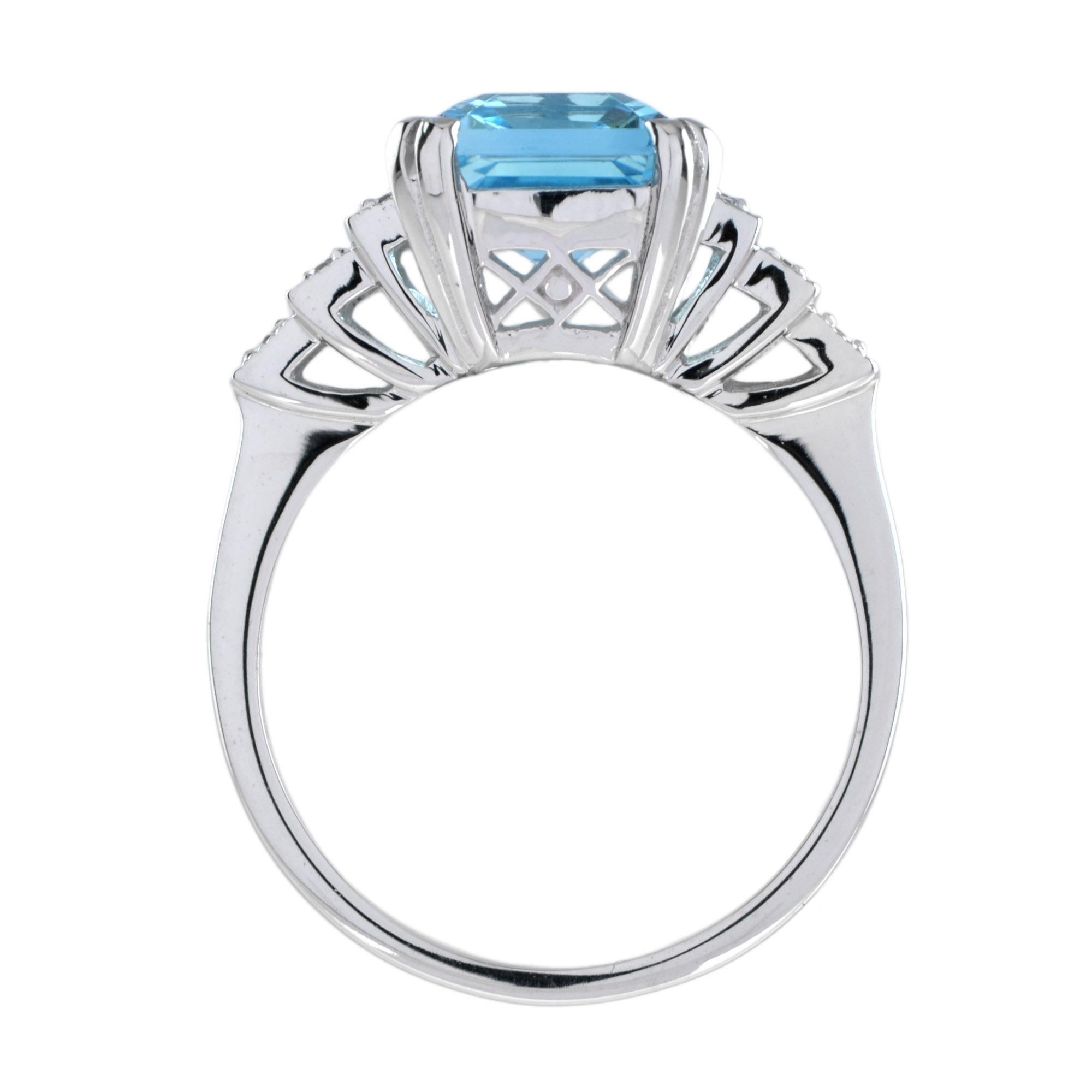 Emerald Cut Blue Topaz and Diamond Step Shoulder Engagement Ring in 9K Gold For Sale 3