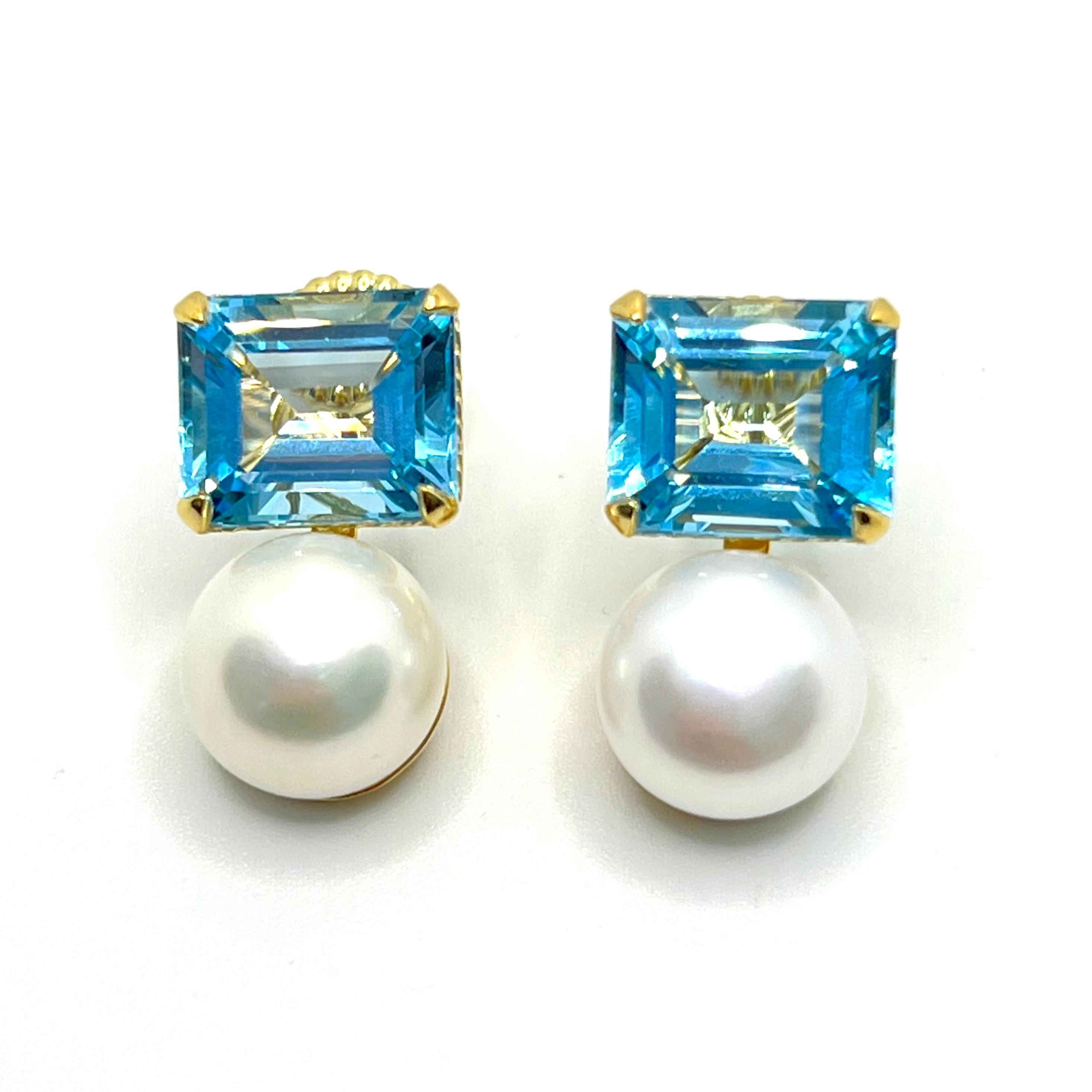 Stunning Bijoux Num Emerald-cut Blue Topaz & Freshwater Pearl Vermeil Earrings. 

The earrings feature 2 beautiful emerald-cut sky blue topaz and 2 lustrous 12mm cultured freshwater pearl, handset in 18k gold vermeil over sterling silver.  Straight