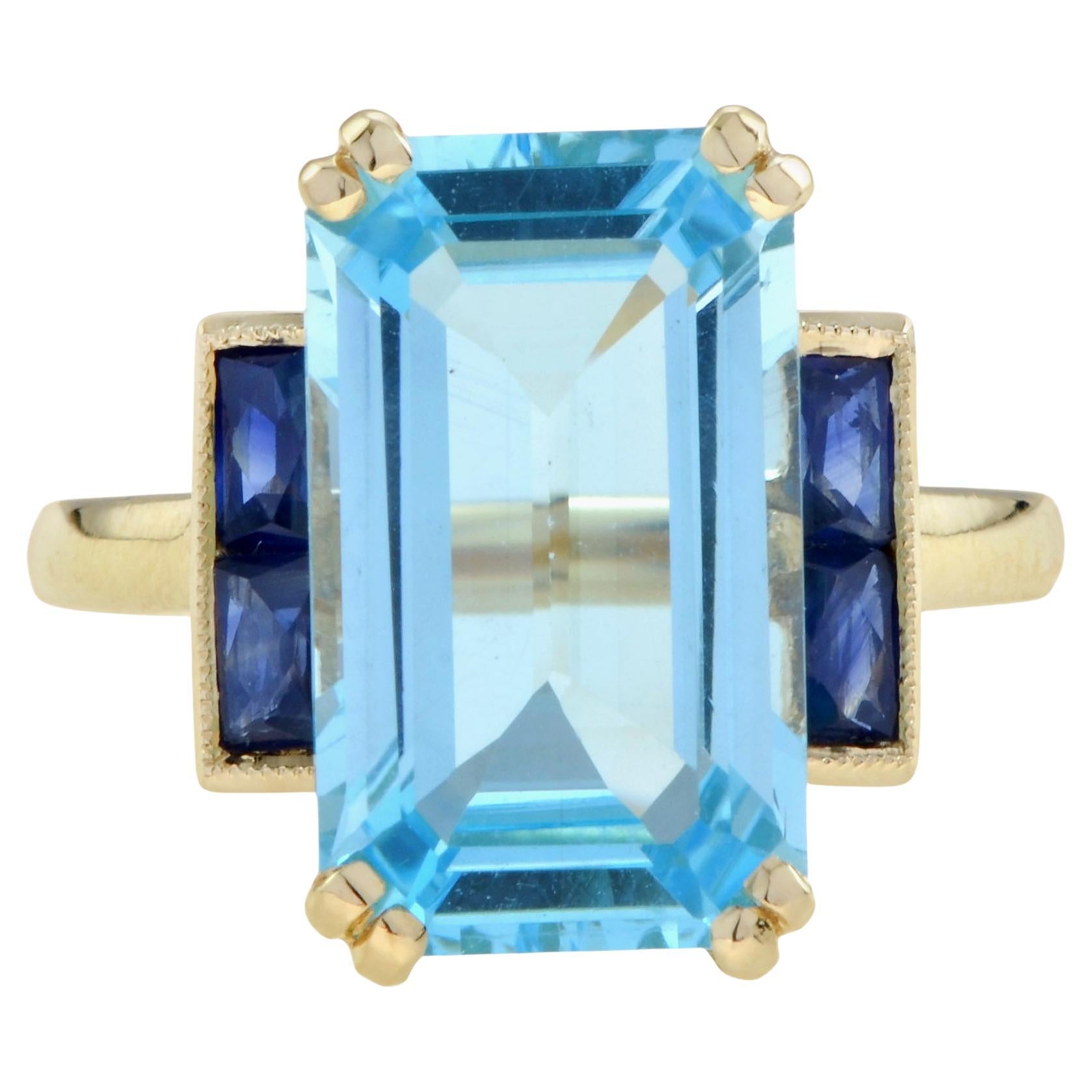 Anello solitario in stile Art Deco con Topazio Blu e Zaffiro taglio smeraldo in oro 9k in vendita