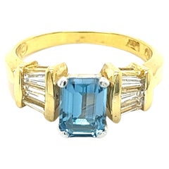 Emerald Cut Blue Topaz & Diamond Ring