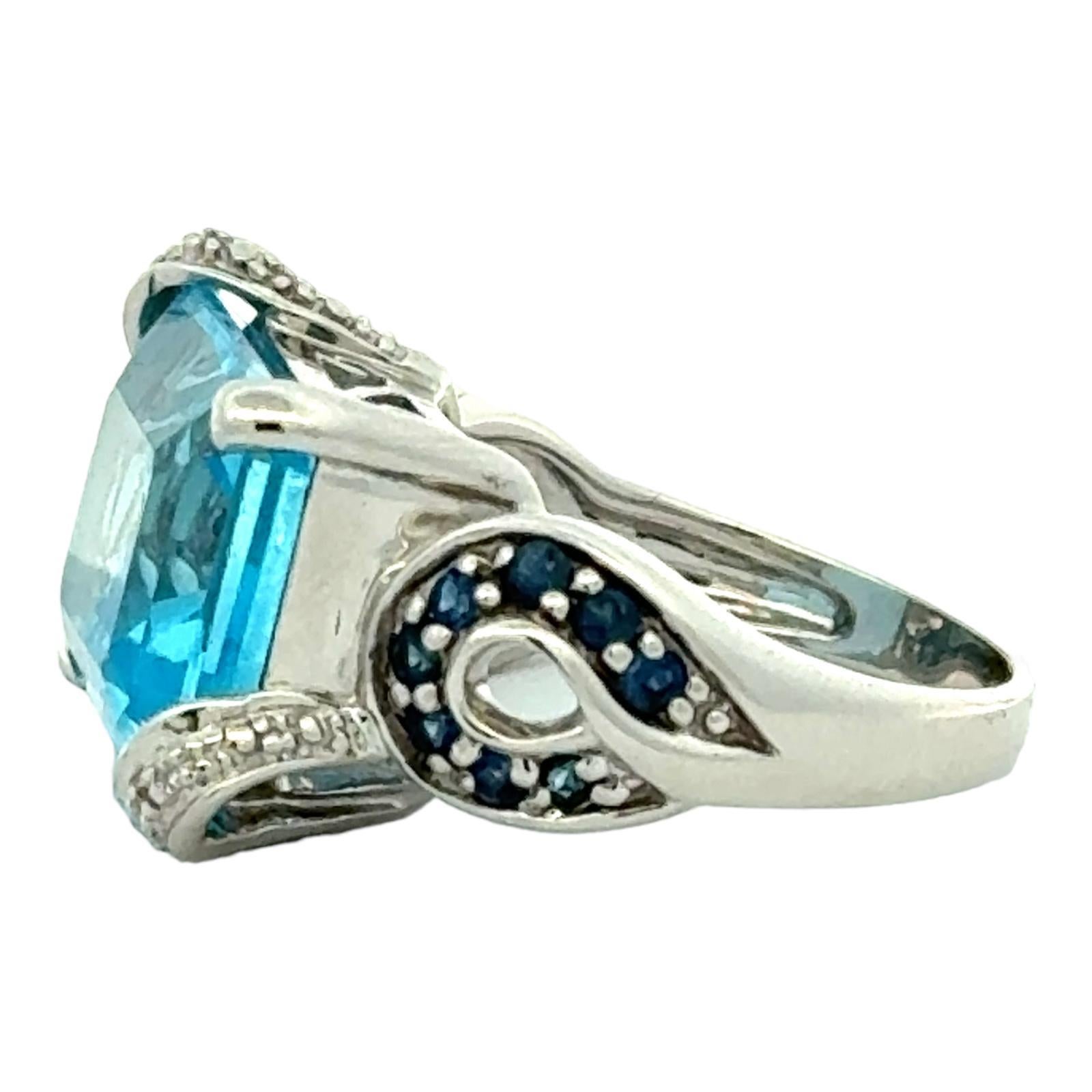 Women's Emerald Cut Blue Topaz Sapphire Diamond 14 Karat White Gold Cocktail Ring For Sale