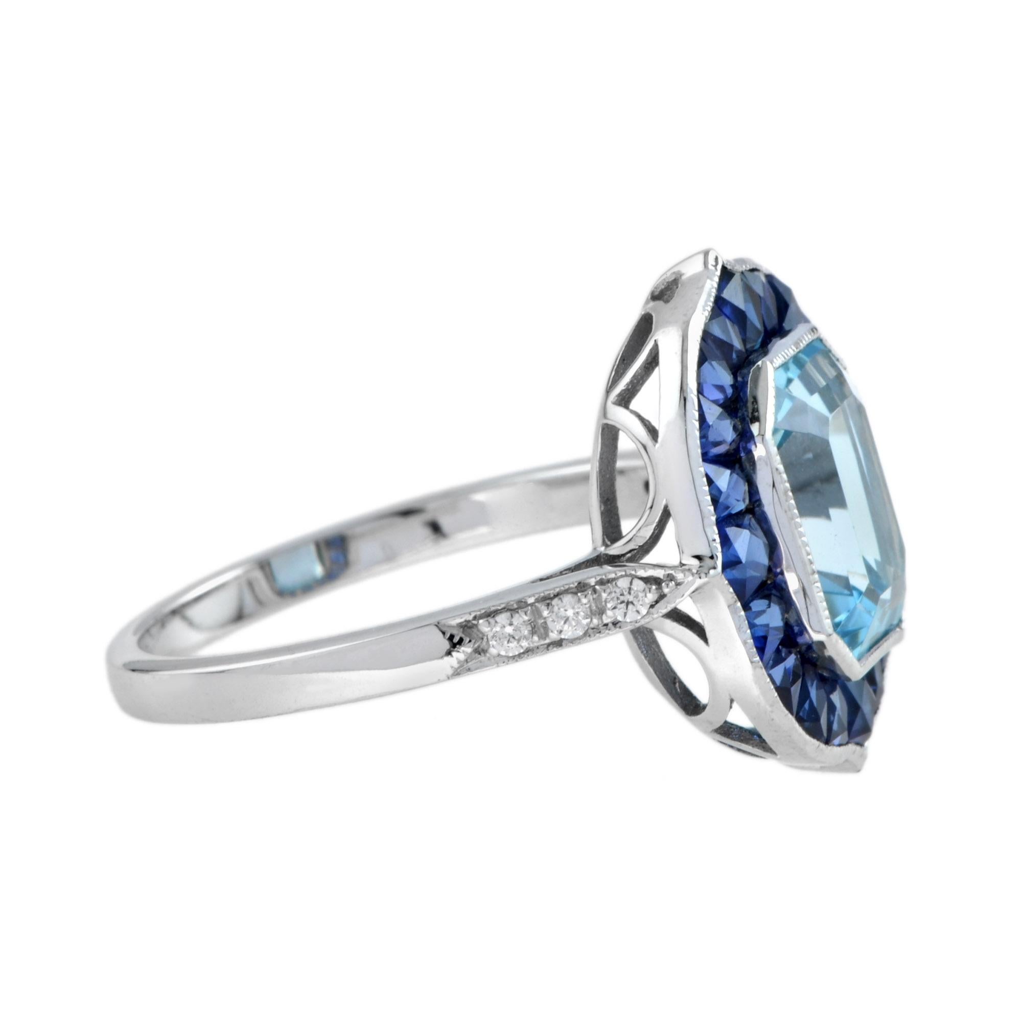 Art déco Bague de fiançailles en or blanc 18 carats avec topaze bleue taille émeraude, saphir et diamant en vente