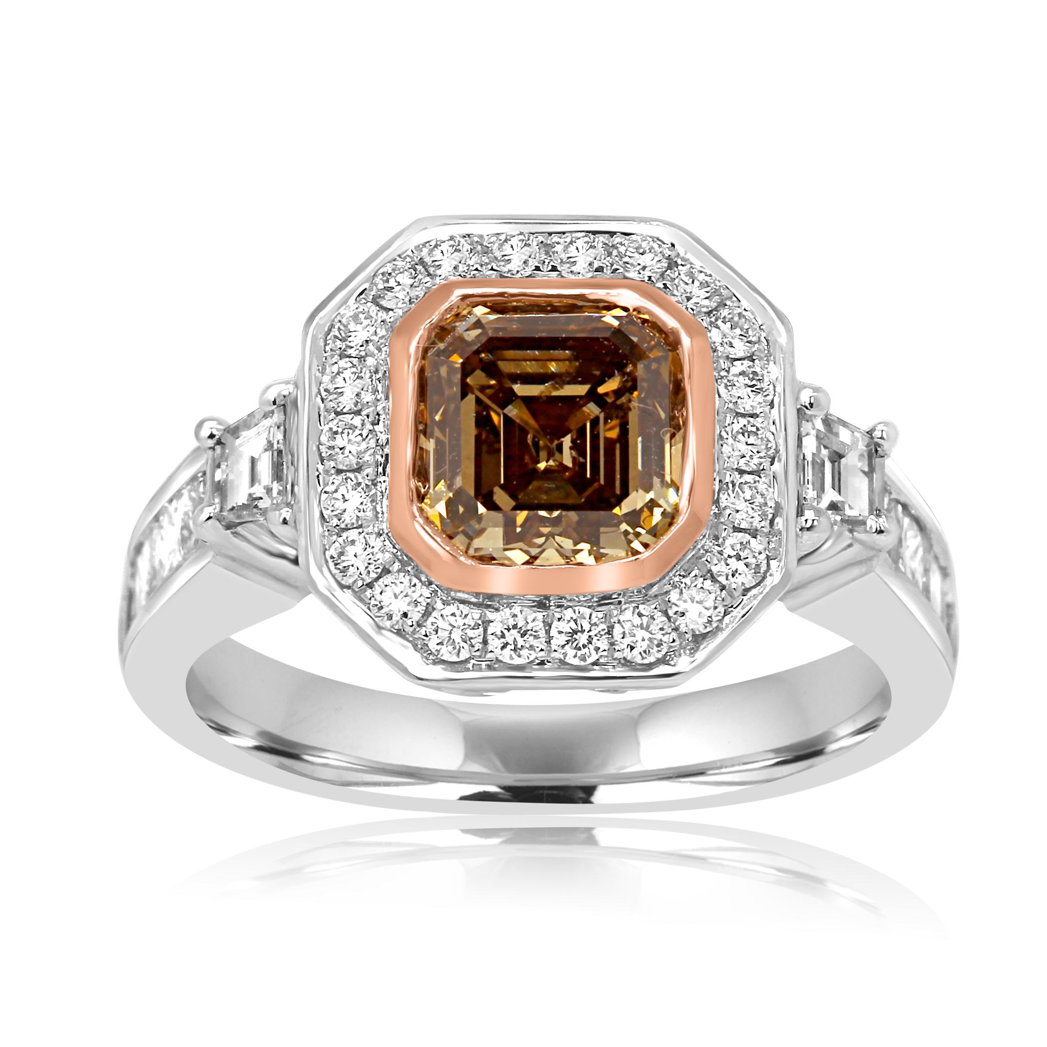 Gorgeous Square Emerald Cut Champagne Diamond VS-SI Clarity Encircled in a single Halo of       26 G-H Color VS-SI Diamond Round 0.25 carat Flanked with 2 G-H Color VS-SI Clarity Diamond Trapazoid 0.18 Carat with 8 G-H Color VS-SI Diamond Princess