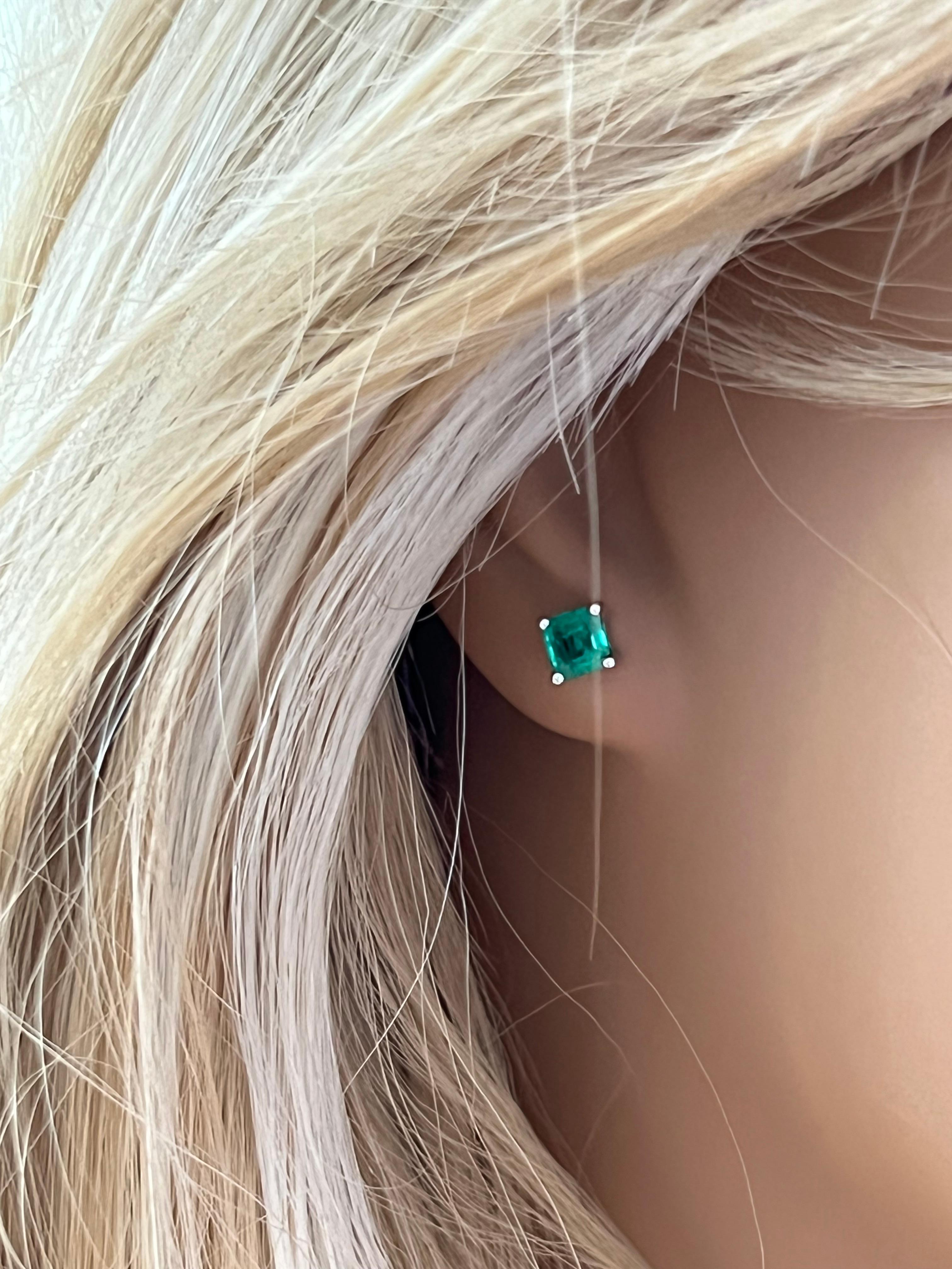Contemporary Emerald Cut Colombia Emerald White Gold Stud Earrings Weighing 1.40 Carat