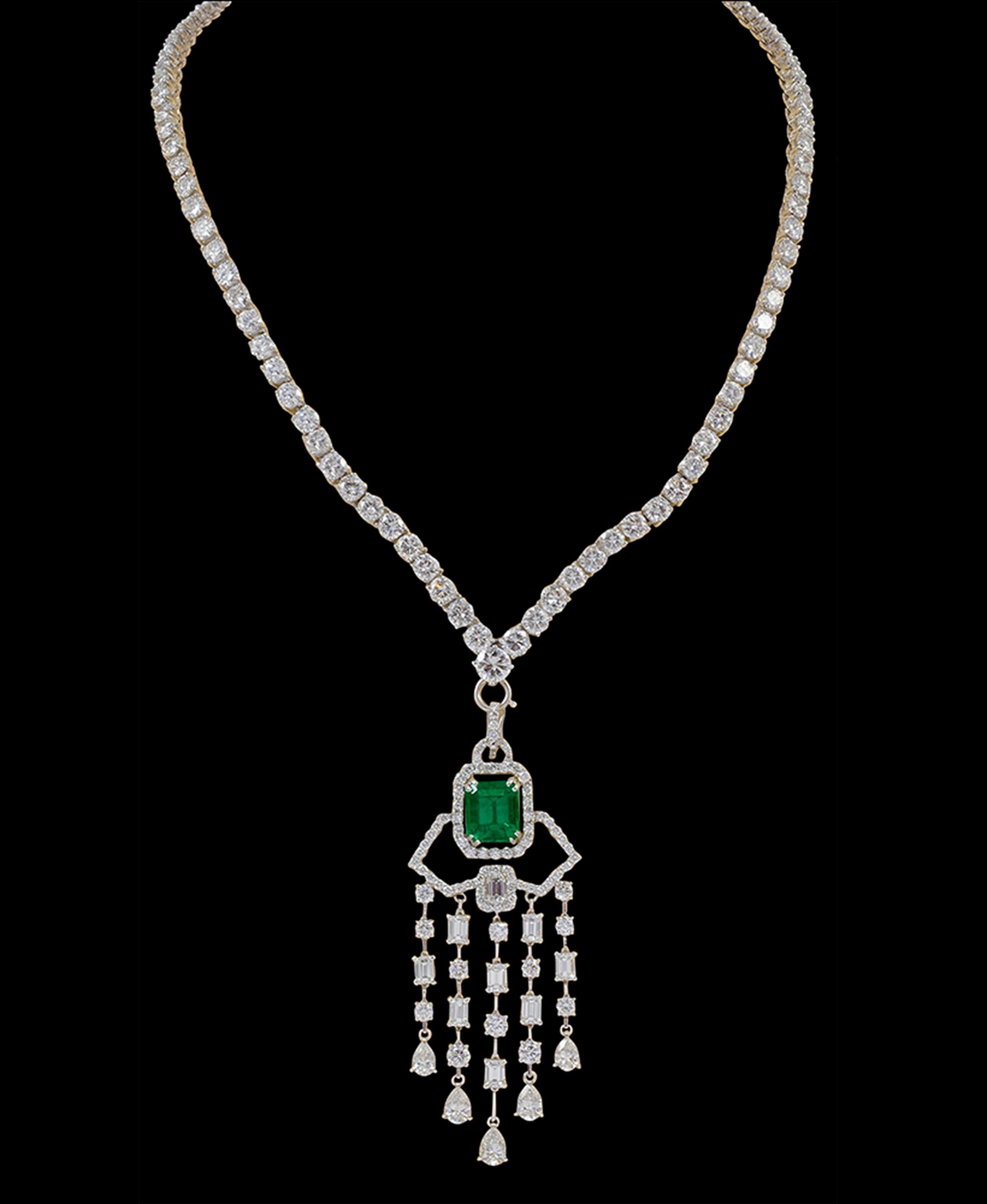 Emerald Cut Colombian Emerald & Diamond  Riviera &   Drop  Changeable  Necklace 18 Karat White gold 
This is Necklace can be worn as just Diamond Rivera Necklace too without the drop
18 Karat white gold Riviera  necklace with Graduating Brilliant