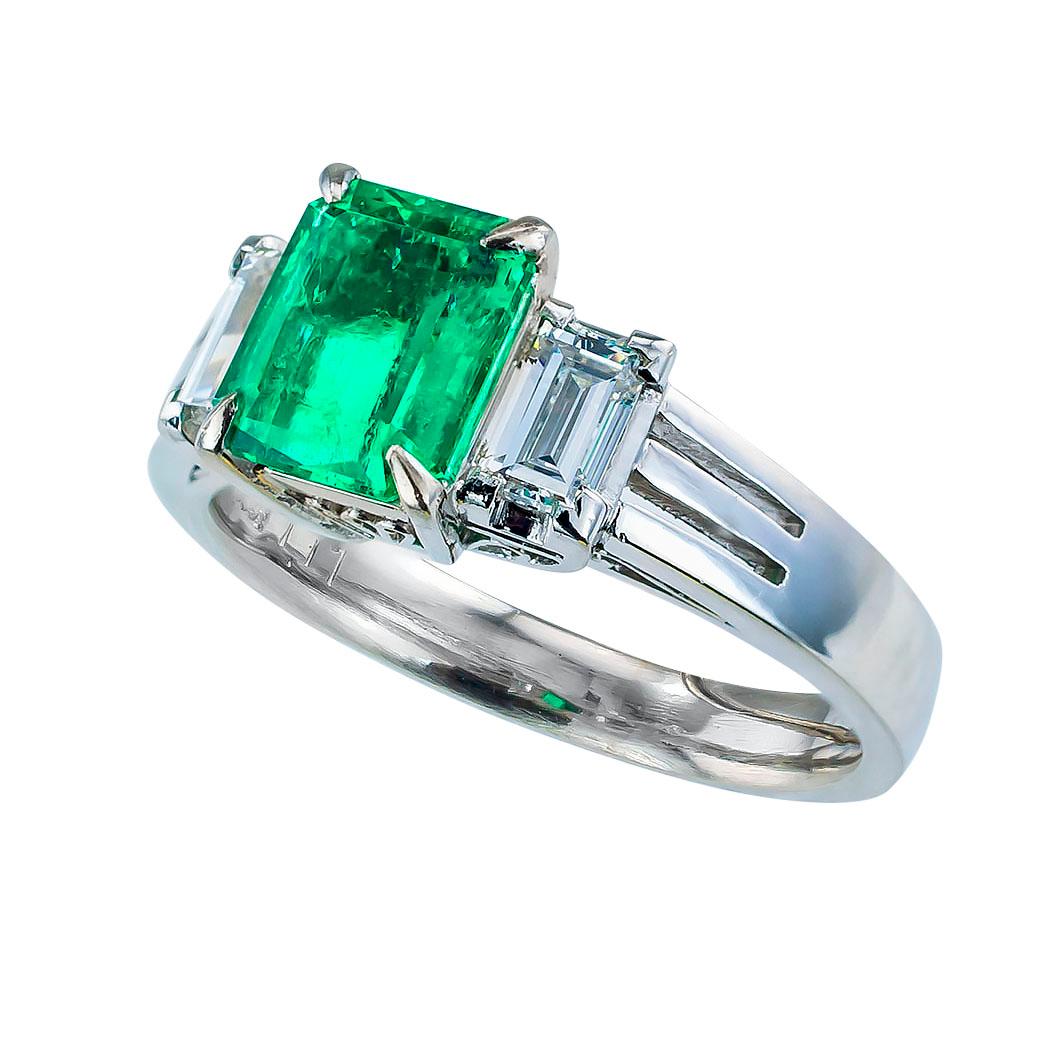 Emerald cut Colombian emerald baguette diamond platinum ring circa 1980.  Love it because it caught your eye, and we are here to connect you with beautiful and affordable jewelry.  It is time to claim a special reward for Yourself!  Simple and