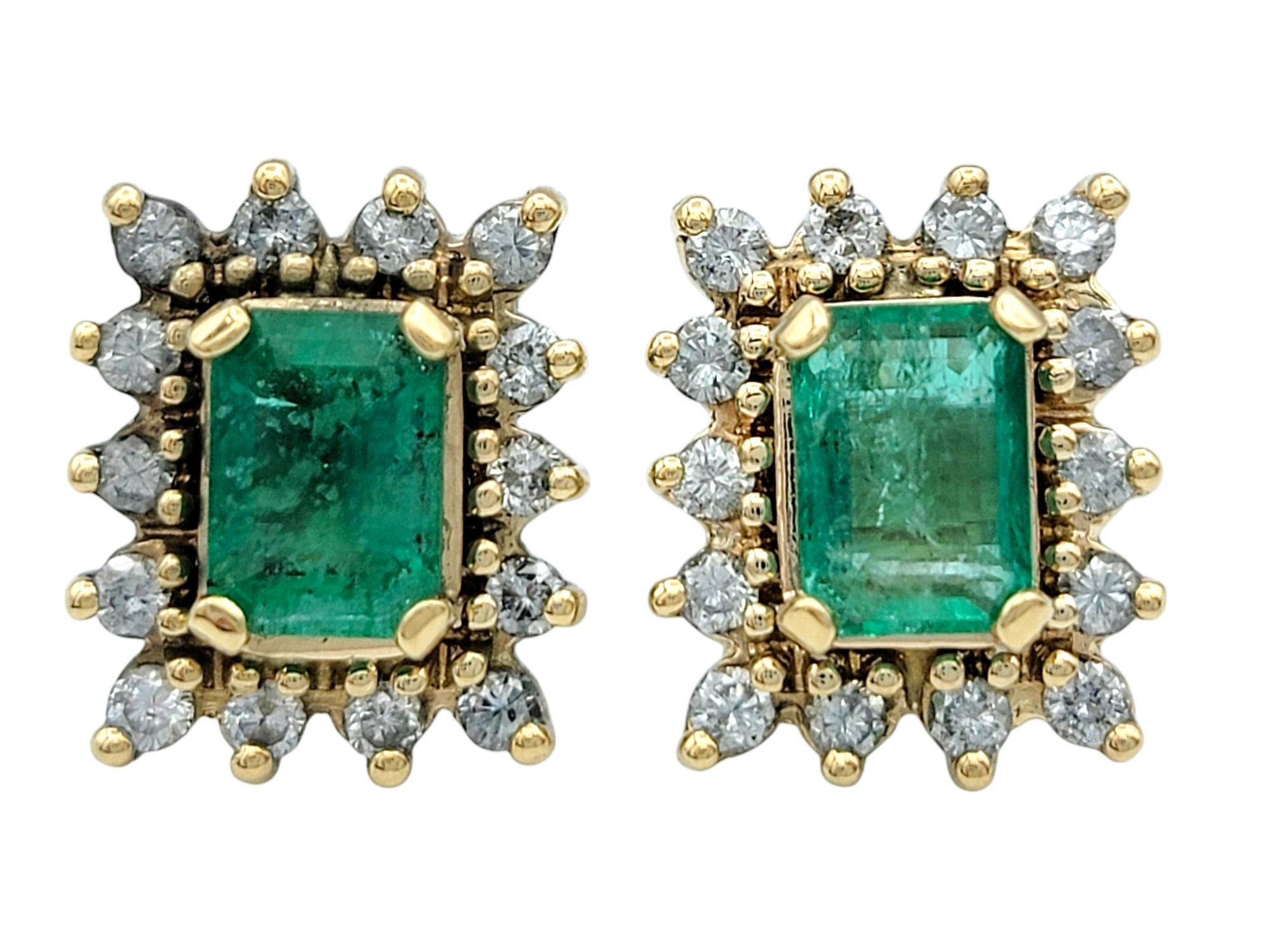 Contemporary Emerald Cut Colombian Emerald Stud Earrings with Diamond Halos in 14 Karat Gold For Sale