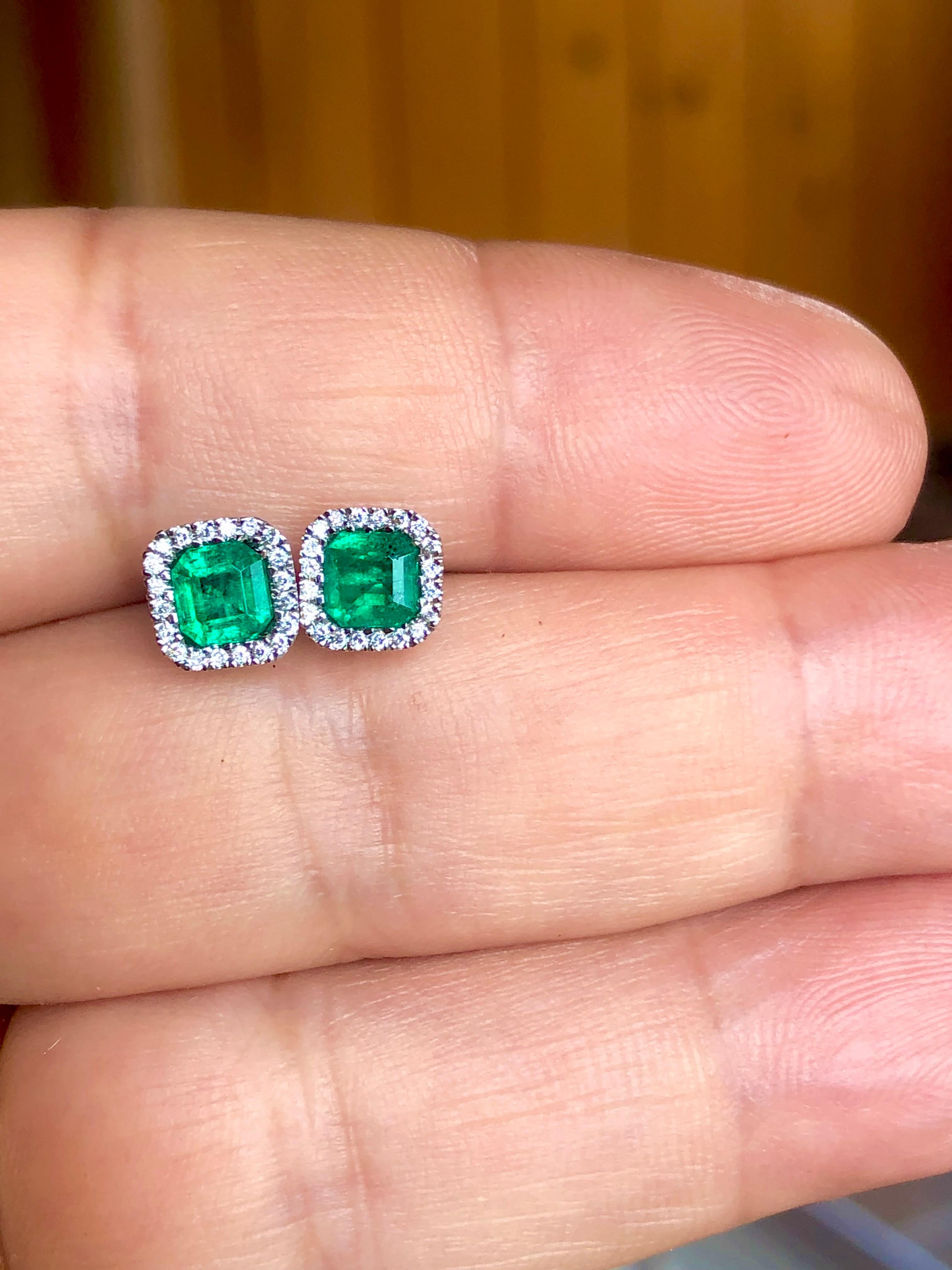 This elegant pair of stud earrings showcases two spectacular Asscher octagonal cut Colombian emeralds Each emerald is surrounded by brilliant round diamonds Made with 18K white gold.

AAA+ Emeralds super fine Colombian excellent transparency 1.00