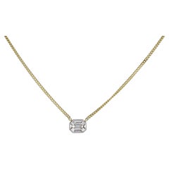 Collar con colgante de oro amarillo de 14 quilates con diamante de 0,56 quilates y varios zafiros