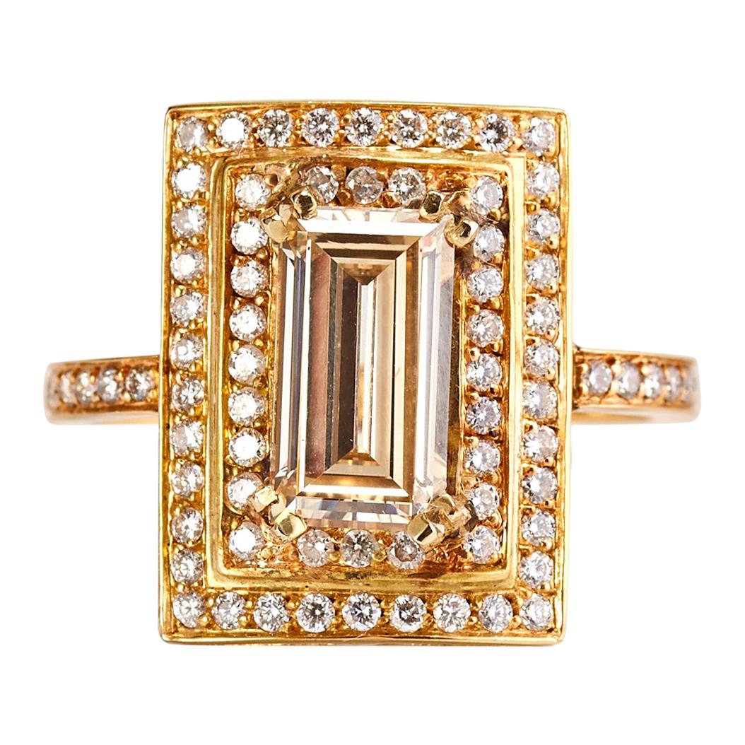 Emerald Cut Diamond and 14 Karat Yellow Gold Ring with Double Halo of Diamonds For Sale