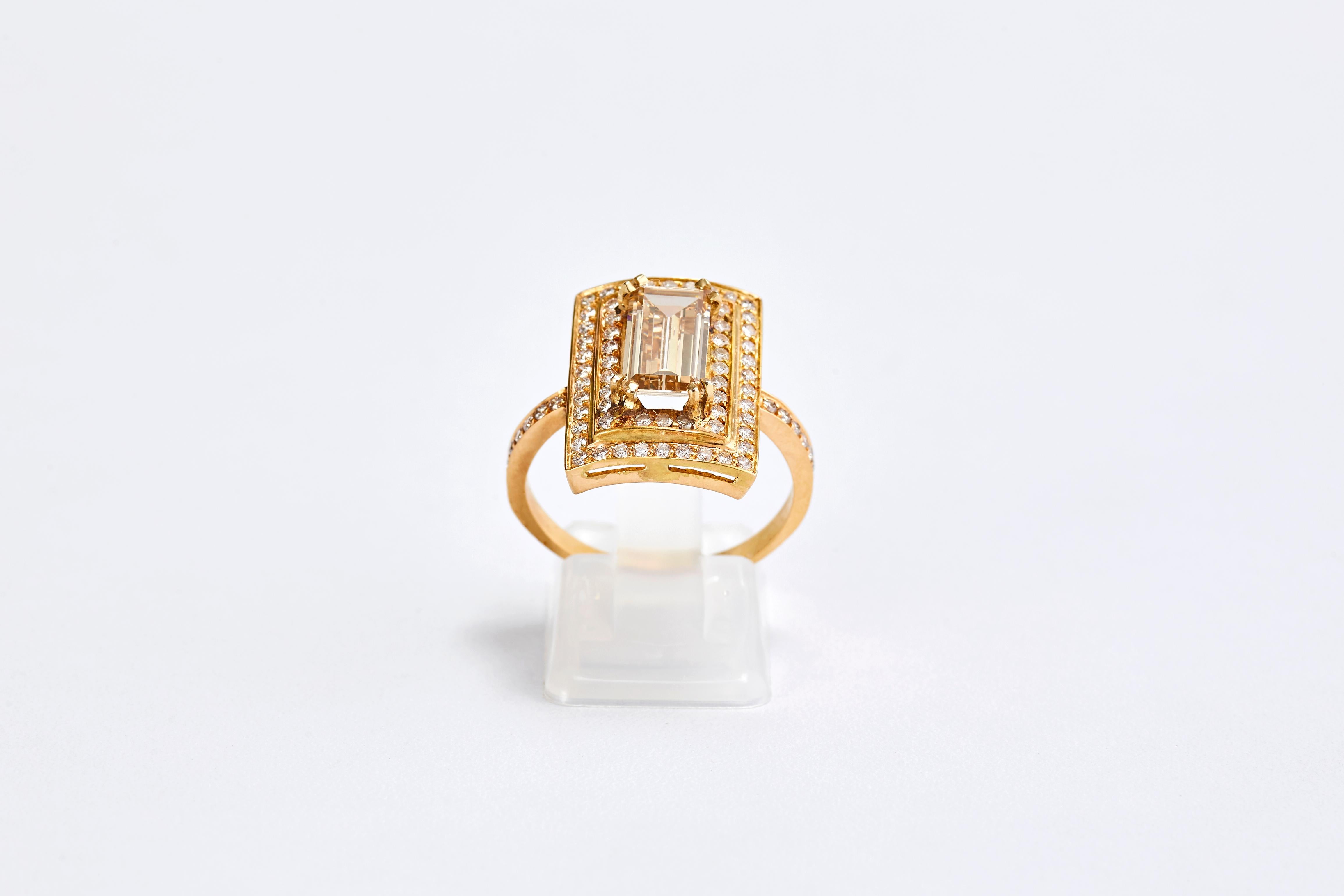 Emerald Cut Diamond and 14 Karat Yellow Gold Ring with Double Halo of Diamonds For Sale 1
