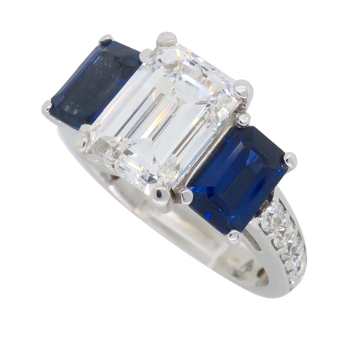 Emerald Cut Diamond and Blue Sapphire Three-Stone Engagement Ring 1