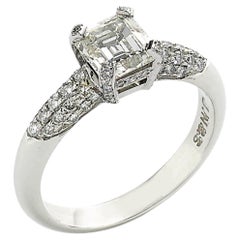 Emerald Cut Diamond and Platinum Ring With Pavé Set Shoulders, 1.23ct