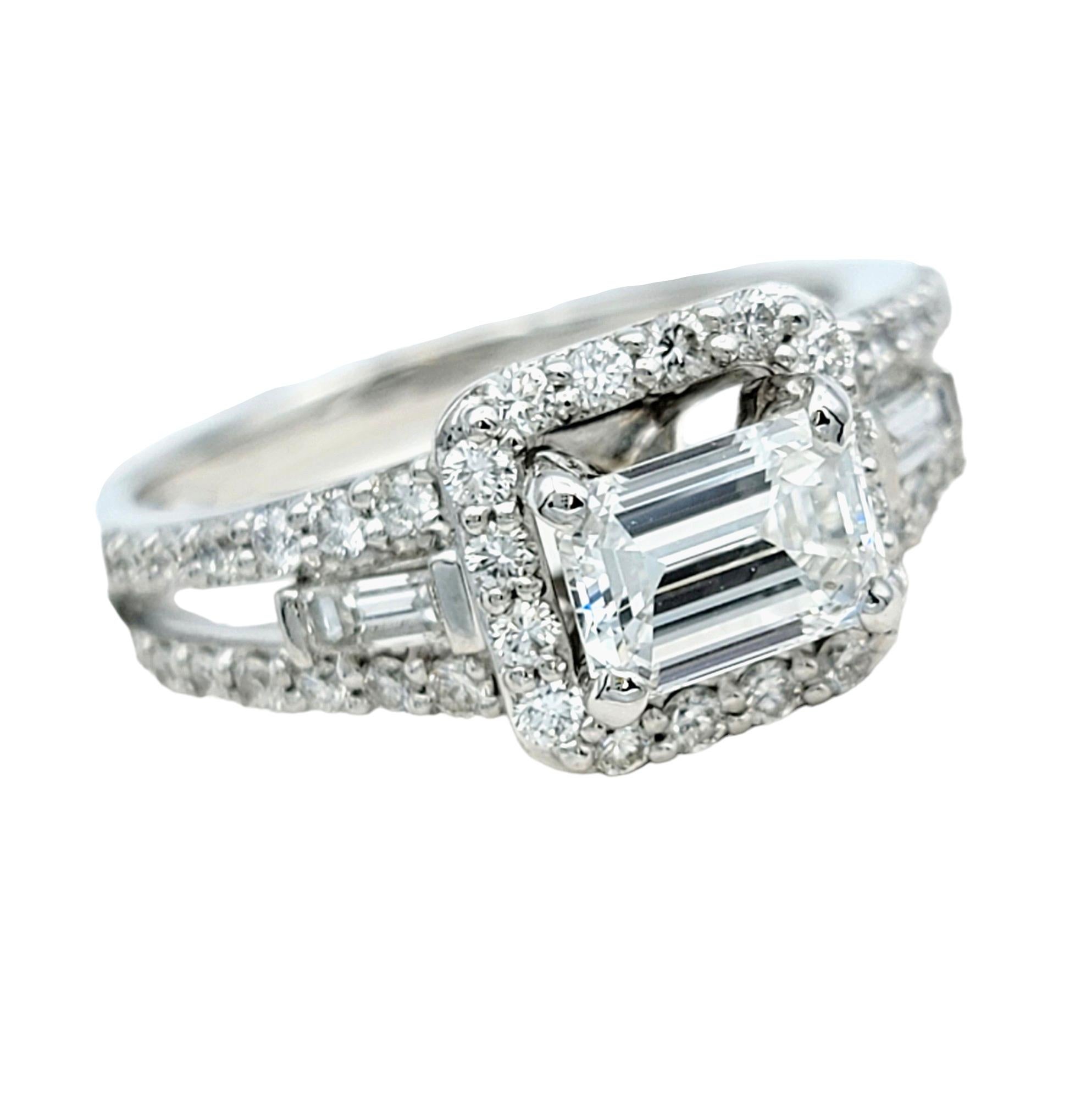 Ring Size: 5.25

Exuding timeless elegance and unparalleled brilliance, this stunning emerald cut diamond ring, set in luxurious 14 karat white gold, is a masterpiece of sophistication and refinement. At its heart gleams a breathtaking emerald cut