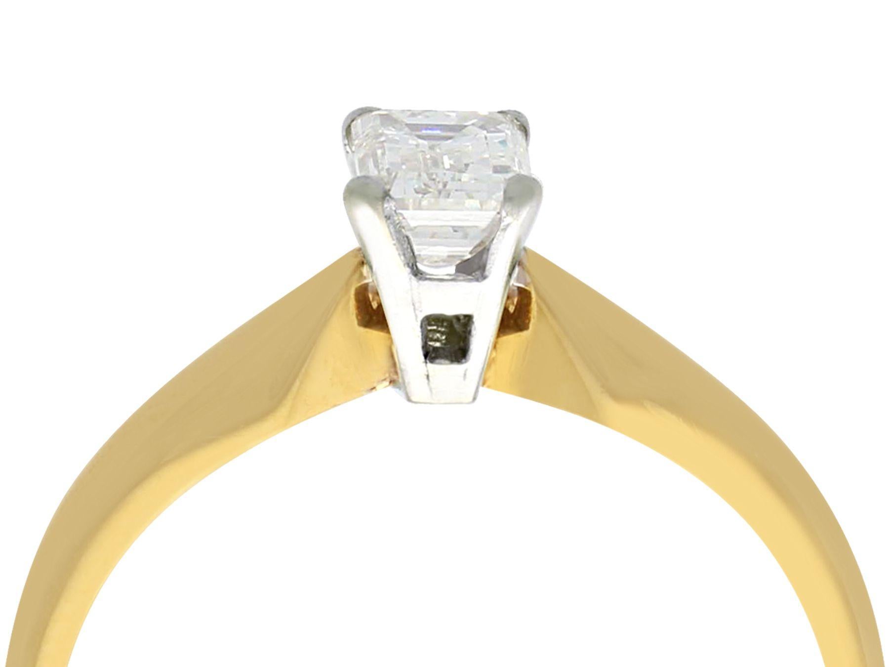 A fine 0.59 carat emerald cut diamond, 18k yellow gold, platinum set solitaire ring; part of our diverse diamond jewelry collection

This fine contemporary diamond ring has been crafted in 18k yellow gold.

The ring displays a four claw / prong