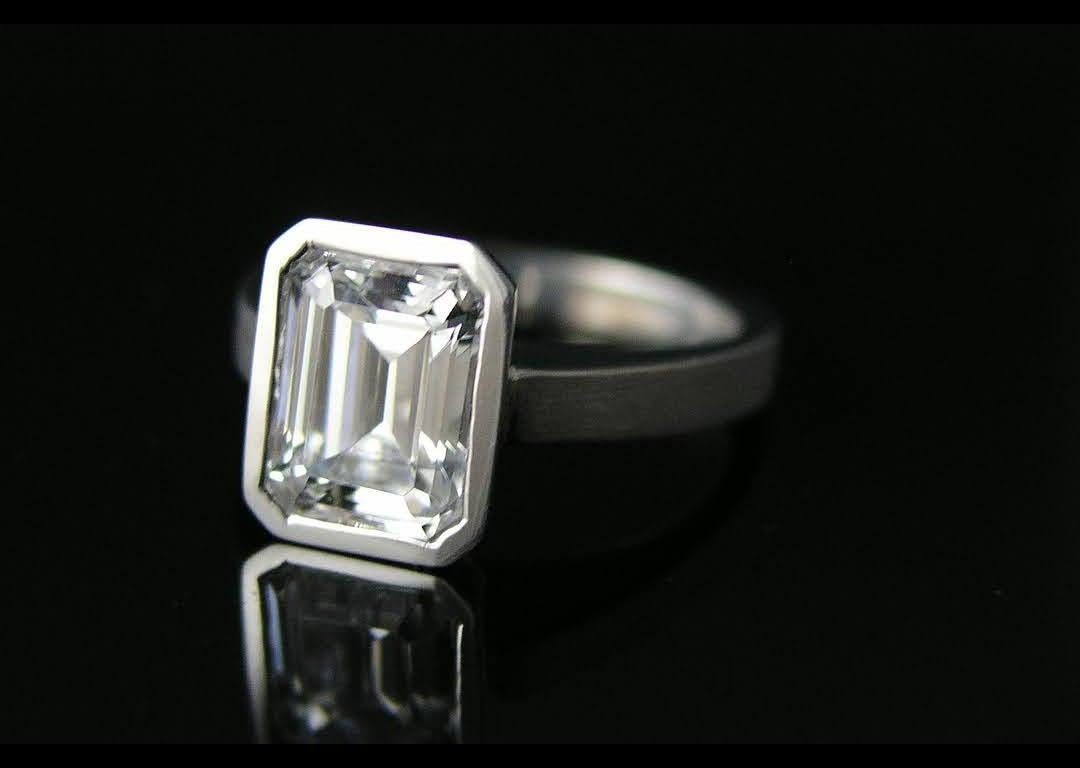 For Sale:  Emerald Cut Diamond Bezel Solitaire Ring 3