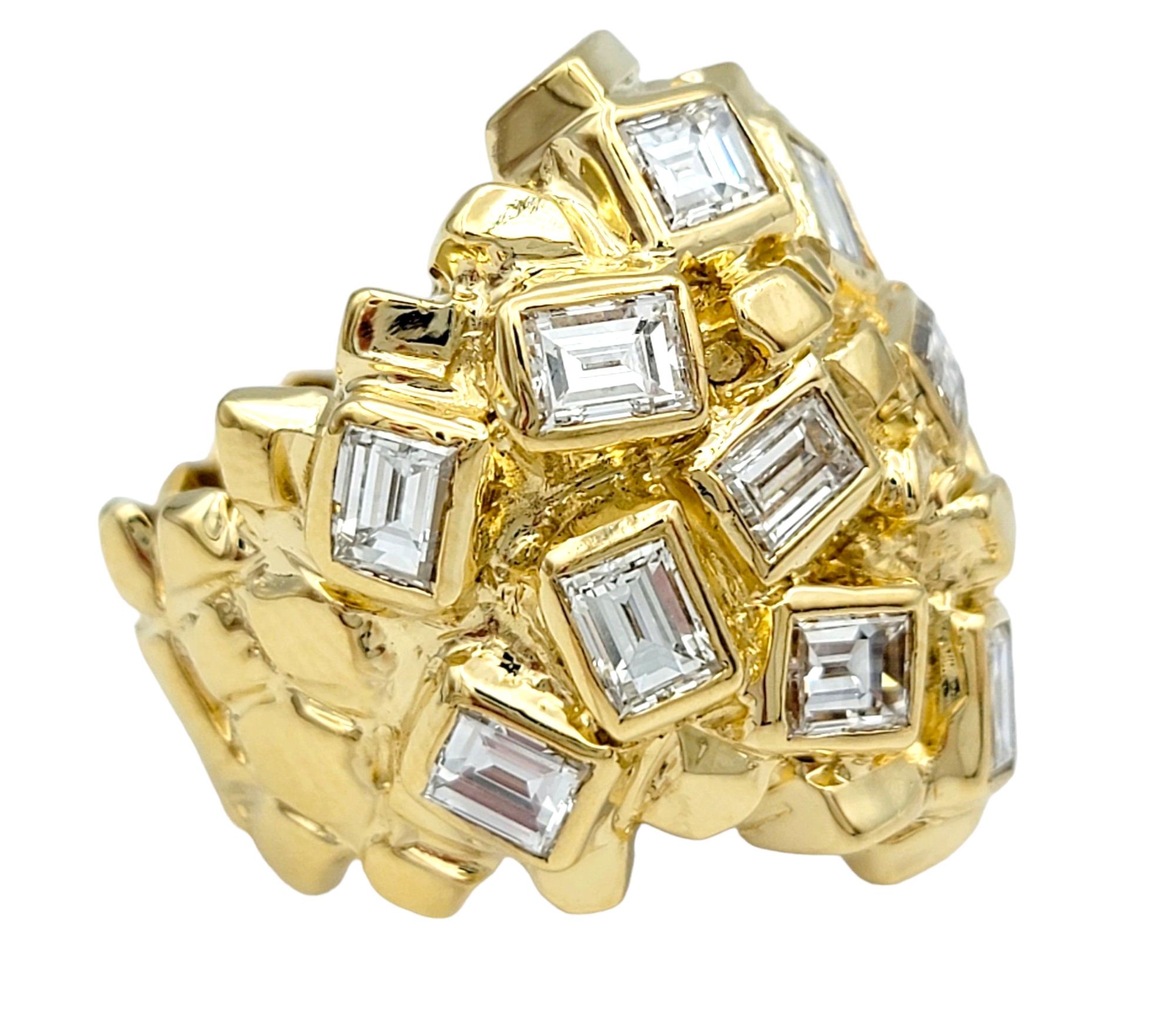 Ring Size: 6.25

This beautiful cocktail ring boasts a unique design, exuding elegance and sophistication. Crafted in 14 karat yellow gold, it features emerald cut diamonds scattered throughout, creating a dazzling display of brilliance and