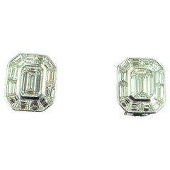 Emerald Cut Diamond Earrings set in Platinum.