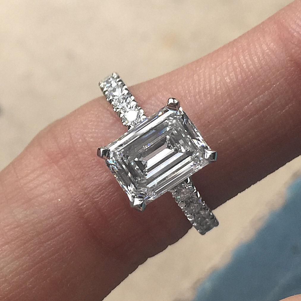 Emerald Cut Diamond Center Stone Set In Platinum W/ Diamonds Down Shank 2.50 Carat Total (Apprx)

Ring May be made to order from scratch to accommodate your exact finger size 

or a different stone if the budget requires it, takes approximately 7-10