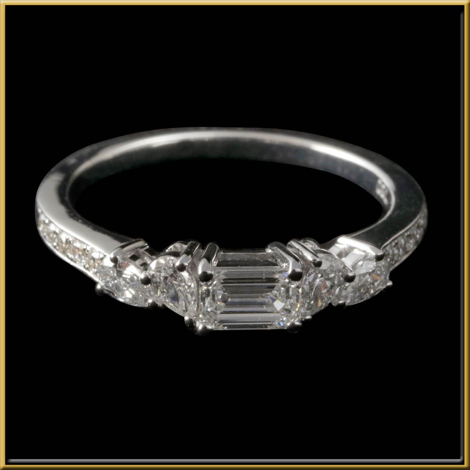 For Sale:  Emerald Cut Diamond Engagement Ring in 18 Karat Gold 2
