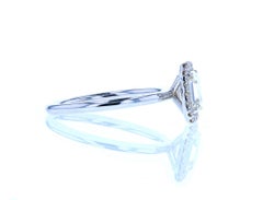 Emerald Cut Diamond Engagement Ring with Classic Diamond Halo
