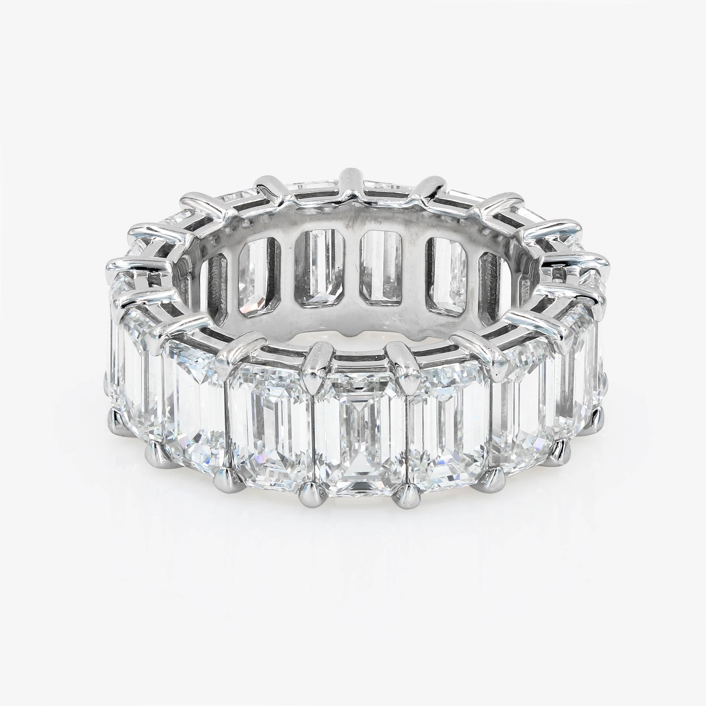 This exquisite eternity band is set in platinum with 17 GIA Certified Emerald cut Diamonds = 11.90cts. tw. They average .70ct. each stone.

The pieces comes with GIA Diamond Grading Reports on all stones. They range from D-G color and VS1-SI