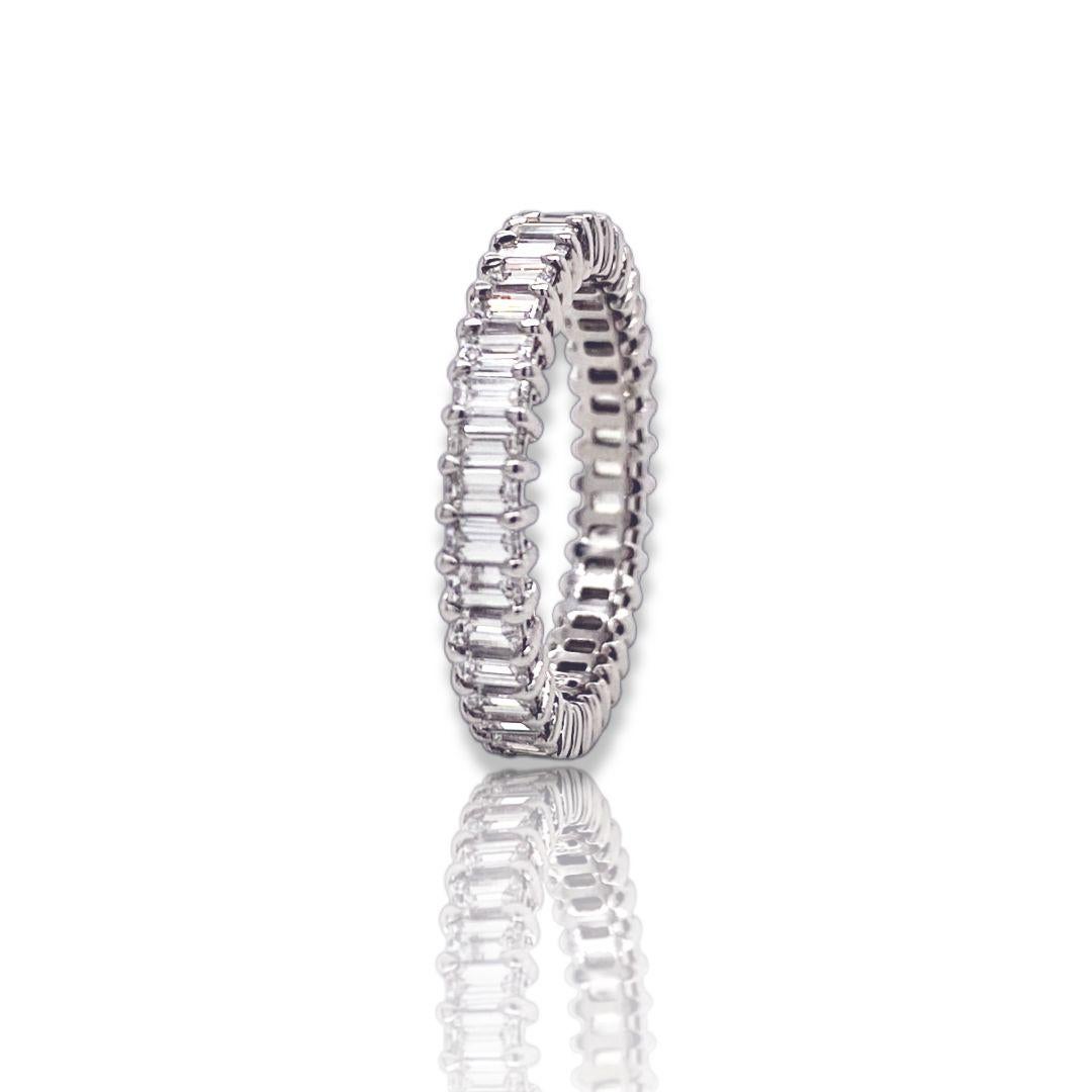 This petite emerald cut diamond eternity band has 5 pointer diamonds.
the ring has 37 diamonds, with 2.05 total carat weight.
The diamonds are I color, VS clarity. 
This diamond eternity band is a finger size 6.25 and is set in platinum.