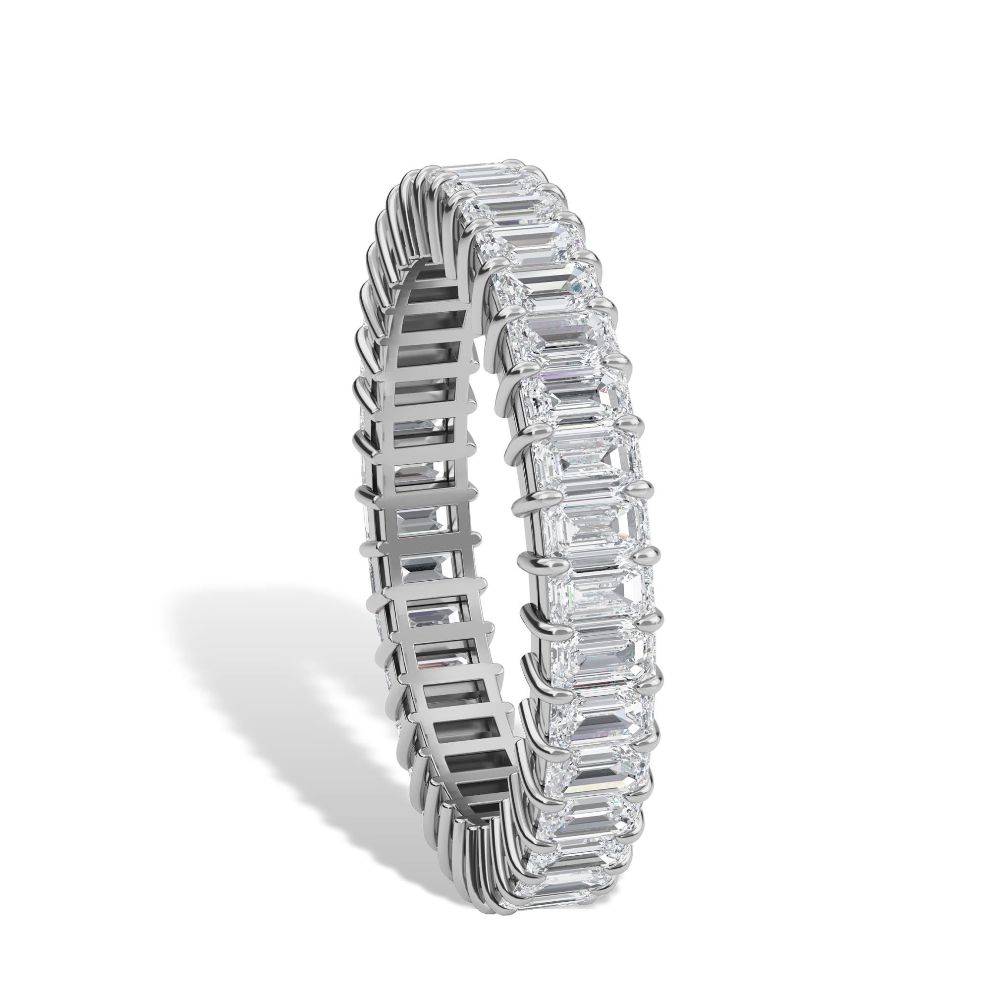 This Emerald cut diamond eternity band has 37 diamonds with a total carat weight of 2.17.
The diamonds are F Color VS clarity. The ring is a finger size 6.5 and is set in platinum.