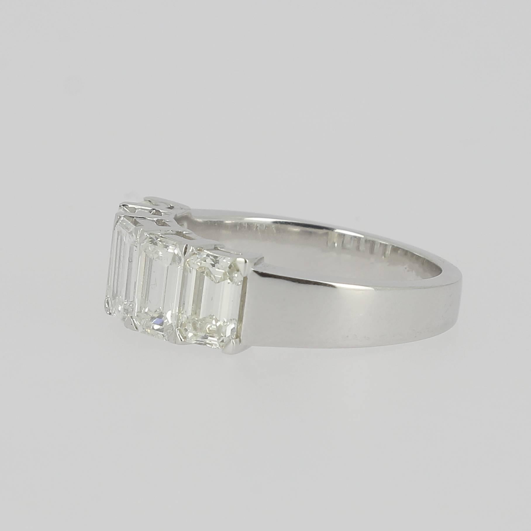 A fine and impressive 2.71 carat Emerald Cut Diamond Ring.
The Engagement ring is set with 5 stones, each Diamond is 0.54 Carats.
The Ring is in 18K White Gold and weight 6.45 grams.
The Size of the ring is 6 ½ US, the ring can be sized quickly.

