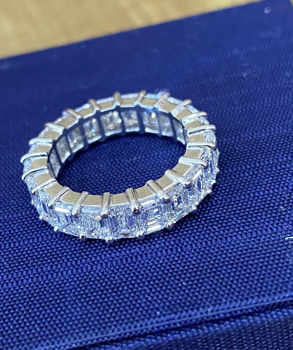 6.40 carats Emerald Cut Diamond Eternity Band in Platinum 

Diamond Eternity Band features 21 Emerald cut Diamonds set in Shared Basket Prong with High Polished Platinum. Each diamond averages 0.30 carat each.

Total diamond weight 6.40