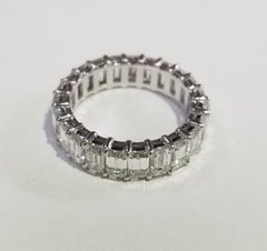 Emerald Cut Diamond Eternity Ring Set in 14 Karat White Gold Weighing 7.25 Carat