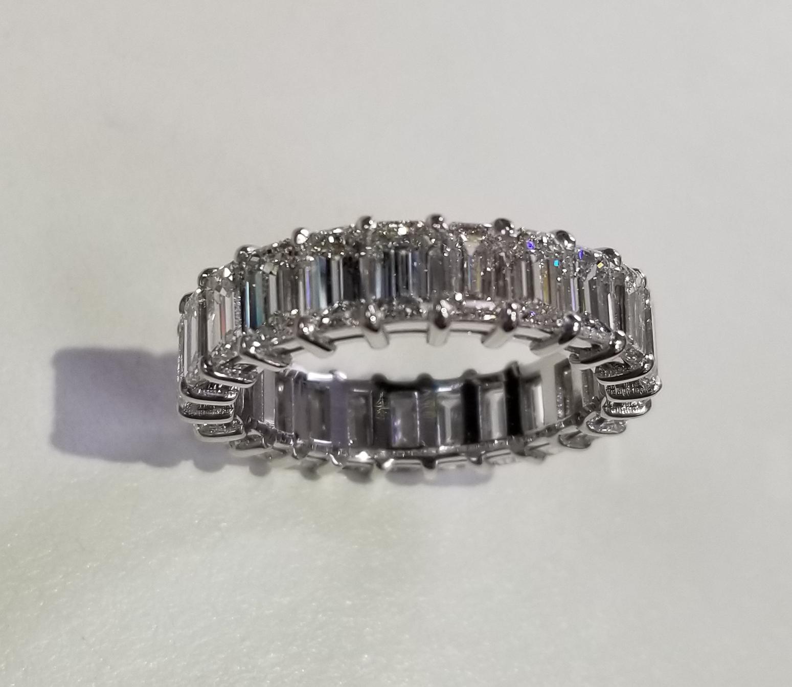 Contemporary Emerald Cut Diamond Eternity Ring Set in 14 Karat White Gold Weighing 7.25 Carat For Sale