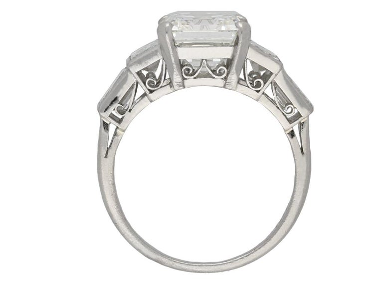 Emerald-Cut Diamond Flanked Solitaire Ring, circa 1950 For Sale at 1stDibs