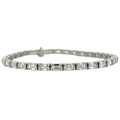 Emerald Cut Diamond Half Bezel Tennis Bracelet in 18KW (10.10ct VVS) by Arnav