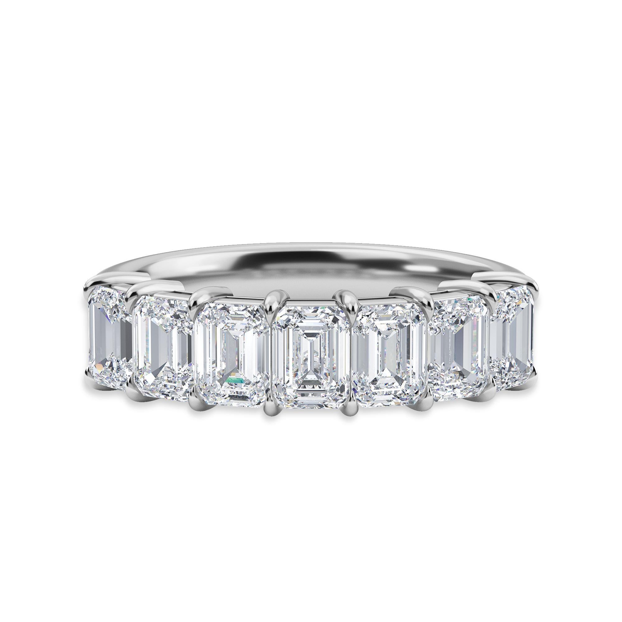 This partway band has 7 Emerald cut diamonds with a total carat of 2.16.
The diamonds are I color VS clarity. The ring is a finger size 6.5 and is set in platinum.