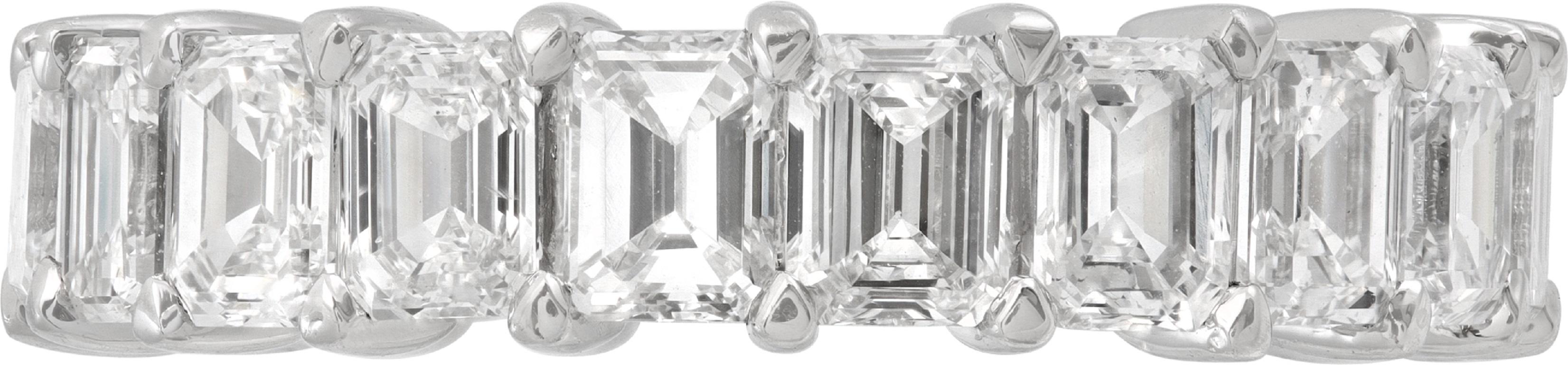 Diamond emerald cut platinum eternity band with 5.12 cararts (20 diamonds) in G-H color, VS-SI clarity diamonds. Size 6.75

This Diamond ring is currently size 6.75 and some items can be sized up or down, please ask! It weighs 3.9 pennyweights and
