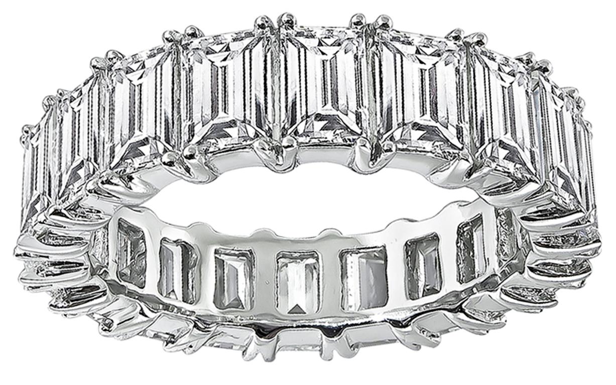 This gorgeous platinum eternity wedding band is set with sparkling emerald cut diamonds that weigh 6.20ct. graded H-I color with VS1 clarity. The band measures 5.5mm in width and weighs 7.1 grams.
The band is size 6 1/2.


Inventory #60133NAKS