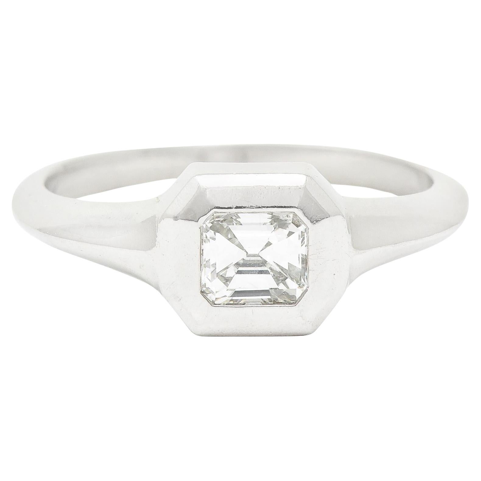 Emerald Cut Diamond Platinum Flush Set Solitaire Unisex Engagement Ring For Sale