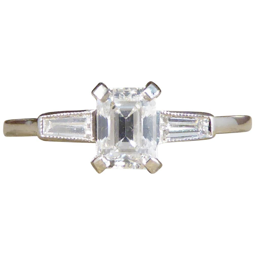 Emerald Cut Diamond Ring with Diamond Baguette Cut Shoulders in Platinum