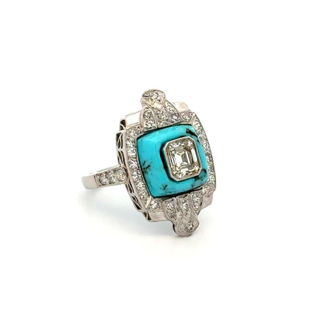Simply Beautiful! Finely detailed Emerald Cut Diamond Set in Turquoise and Diamond Platinum Vintage Ring. Centering a .67 Carat Emerald Cut Diamond set in Turquoise. Surrounded and accented by .65tcw Diamonds. Hand crafted Platinum mounting. Ring